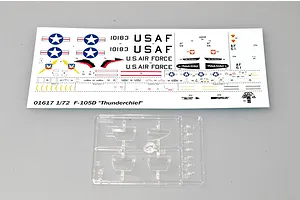 A decal sheet and a clear plastic sprue for a 1/72 scale Trumpeter F-105D Thunderchief model kit.