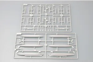 Two grey plastic model kit sprues containing various aircraft weapons and external fuel tanks for a 1/72 scale F-105D Thunderchief model.