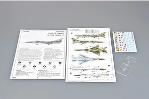 Instruction manuals, decal sheet, and a small clear plastic part for the Trumpeter 1/72 Su-15TM Flagon-F model kit.