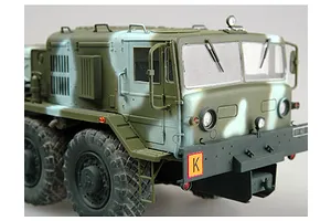 A detailed scale model of a KZKT-537L military airfield truck, featuring a green and light grey camouflage paint scheme and rugged off-road tires.