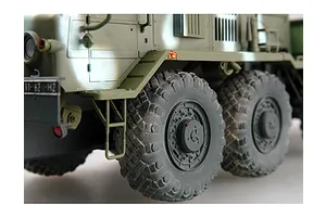 Close-up side view of a 1/35 scale KZKT-537L military truck model showing the front wheels, fender, and chassis details.