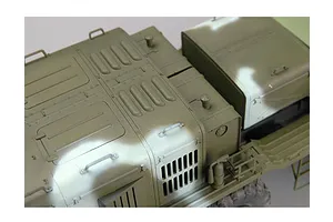 High-angle close-up of a 1/35 scale KZKT-537L military truck model kit, showing detailed olive green camouflage bodywork and engine deck.