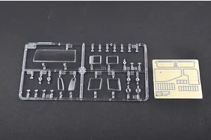A clear plastic sprue containing various window parts and a small photo-etched metal sheet for a 1/35 scale model kit.