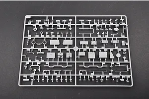 A grey plastic model kit sprue containing various small parts for a 1/35 scale military vehicle model.