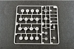 A grey plastic model kit sprue containing various road wheels and sprocket parts for a 1/72 scale tank model.