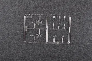 A clear plastic sprue containing two 1/700 scale YAK-38 aircraft model parts and additional components on a dark grey background.