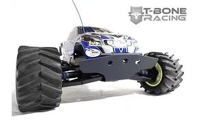 A front-facing view of a Traxxas E-Maxx RC monster truck equipped with a black T-Bone Racing front basher bumper.