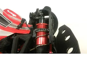 Close-up of a T-Bone Racing skid plate installed on the front shock tower of an ARRMA Typhon RC buggy.