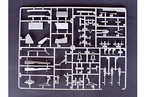 A grey plastic sprue containing various unpainted model aircraft parts for a 1/32 scale Vought F4U-4 Corsair model kit.