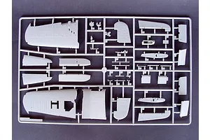A grey plastic model kit sprue containing various aircraft wing and fuselage parts for a 1/32 scale model.