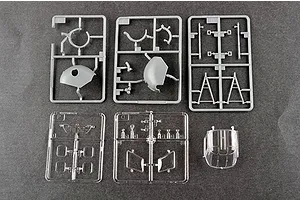 Several grey plastic model kit sprues and clear plastic parts for a 1/48 scale H-34 helicopter model kit.