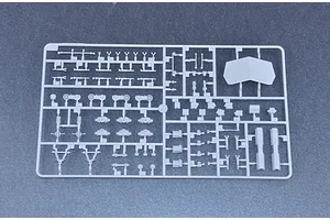 A grey plastic sprue containing various small model parts for the Trumpeter 1/35 Canadian Husky 6x6 AVGP model kit.