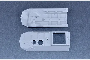 Top-down view of two unpainted grey plastic model kit parts for a 1/35 scale armoured vehicle, showing the hull interior and upper deck.
