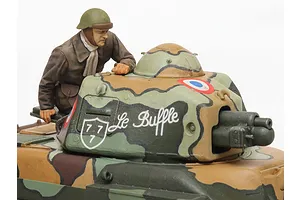 A close-up of a 1/35 scale Tamiya French R35 tank model with a painted crew figure, featuring camouflage paint and the name Le Buffle on the turret.