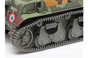 Close-up of the tracks and suspension system on a painted 1/35 scale Tamiya French R35 tank model kit.