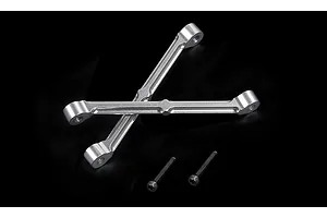Two silver aluminium RC shock tower braces arranged in an X shape with two black socket head screws below them on a black background.