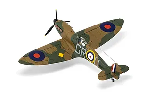 A high-angle studio shot of a completed 1/72 scale Supermarine Spitfire Mk.IA model aircraft, featuring a camouflage paint scheme and RAF markings.