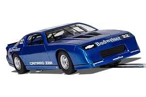 A blue Scalextric 1/32 scale Chevrolet Camaro IROC-Z slot car with Budweiser livery and number 22 on a track.