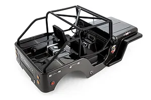 A high-angle studio shot of a grey painted 1/10 scale RC crawler body shell featuring an open-top design with a black roll cage and detailed interior.