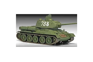 A studio shot of an assembled and painted 1/35 scale Academy T-34/85 tank model, featuring olive green paint and the number 738 on the turret.