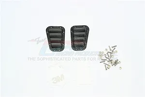 Two black plastic fender vents for RC cars, accompanied by a set of small metal screws, nuts, and two 3M adhesive pads on a white background.