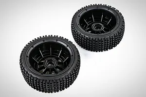 Two Rovan V5 Dirt Buster nail tread RC buggy tyres mounted on black beadlock rims, viewed from an angle against a white background.