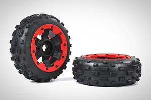 Two Rovan RC buggy wheels with black knobby tires and red beadlock-style rims, one standing upright and one lying flat on a white background.