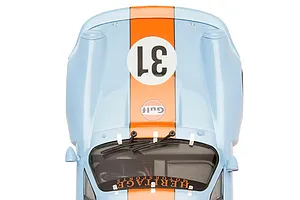 Top-down view of a light blue and orange Gulf livery Scalextric Porsche 911 Carrera RSR 3.0 slot car with the number 31 on the hood.