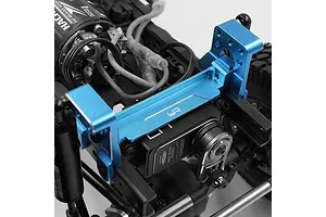 A blue anodized aluminium servo mount installed on a Tamiya CC-02 RC chassis, featuring the Yeah Racing logo.