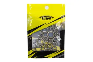 A sealed plastic bag containing a set of various sized metal shielded ball bearings for RC cars, branded with the Yeah Racing logo.