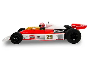 Side profile of a Scalextric 1/32 scale McLaren M23 slot car, number 29, in white and red livery with Goodyear and Texaco branding.