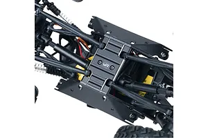A close-up view of a black aluminium centre skid plate installed on an RC crawler chassis, featuring the Yeah Racing logo.