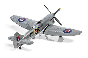 A high-angle studio shot of a 1/72 scale plastic model of a Hawker Tempest Mk.V fighter aircraft, painted in silver with RAF markings.