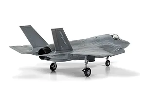 A rear three-quarter view of a fully assembled and painted 1/72 scale Lockheed Martin F-35B Lightning II plastic model aircraft on a white background.