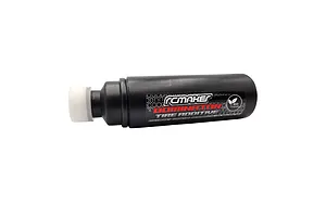 A black plastic bottle of RC Maker Dominator Asphalt Tire Additive with a white foam applicator tip on a white background.