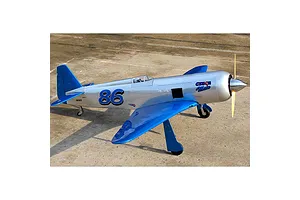 Seagull RC Reno Yak 11 Czech Mate model plane in pearl blue and chrome finish, parked on a concrete runway.