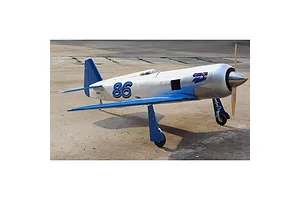 A Seagull RC Reno Yak 11 Czech Mate warbird model plane in silver and blue livery sitting on a concrete runway.