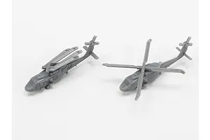 Two unpainted grey plastic 1/700 scale helicopter models for a ship kit, one with folded rotors and one with extended rotors.