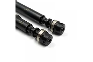 Close-up of two black Yeah Racing HD steel centre driveshafts with silver spring collars on a white background.