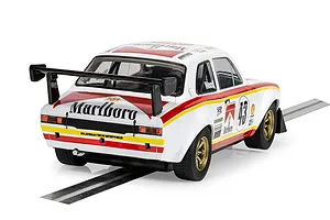 Rear three-quarter view of a white Scalextric Ford Escort MK1 slot car with red and yellow racing livery and number 43 on a track.
