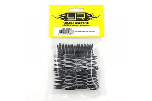 A sealed plastic bag containing a set of black RC shock springs from Yeah Racing, labeled DSG-002BK.