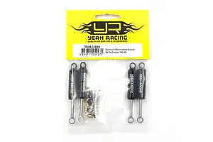 Four black Yeah Racing aluminium shock absorbers in a sealed plastic retail bag with a yellow header card.