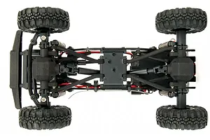 Top-down view of the chassis of an Element RC Enduro24 Ecto 1/24 scale rock crawler, showing the drivetrain, suspension, and wheels.
