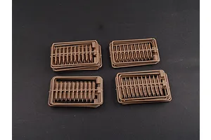 Four sprues of brown plastic tank track links for a 1/35 scale model kit, arranged on a dark grey background.