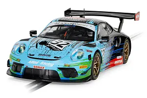 A 1/32 scale Scalextric Porsche 911 GT3 R slot car in Redline Racing livery, featuring a blue, black, and green paint scheme with gold wheels.