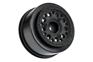 A single black Pro-Line 2.2/3.0 inch short course RC wheel rim shown from a three-quarter angle against a white background.