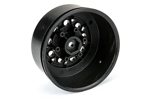 A black Pro-Line 2.2/3.0 inch short course RC wheel rim shown from an angled perspective against a white background.