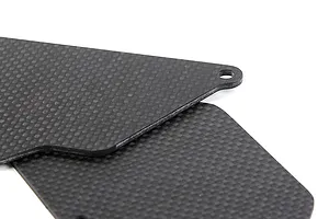 Close-up of two flat, black carbon fibre suspension arm guards with a woven texture and a mounting hole.