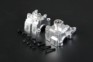 A pair of silver aluminium RC gearbox case halves with a set of black mounting screws on a dark background.