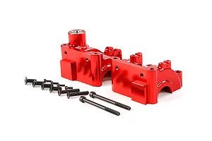 A pair of red anodized aluminium RC gearbox case halves with a set of black mounting screws on a white background.